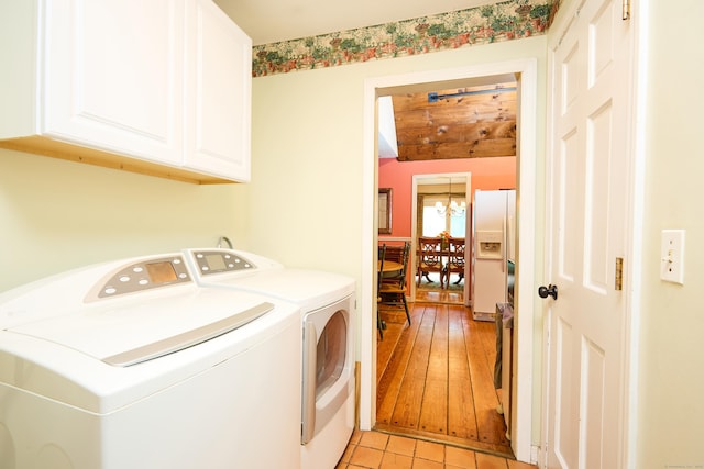 581 Oxford Rd, Oxford, CT 06478 - washroom with cabinet space, independent washer and dryer, and light tile patterned floors