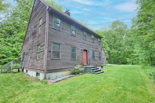 581 Oxford Rd, Oxford, CT 06478 - view of property exterior with a chimney and a lawn