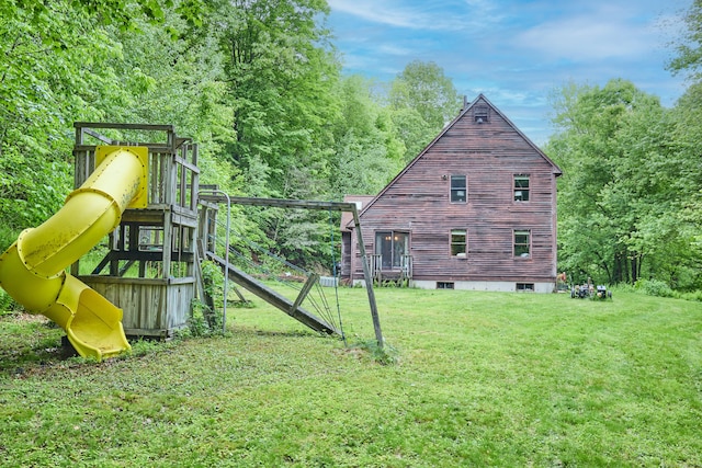 581 Oxford Rd, Oxford, CT 06478 - view of side of home with a playground and a lawn