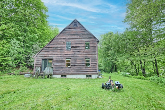 581 Oxford Rd, Oxford, CT 06478 - back of house with a lawn, entry steps, and cooling unit
