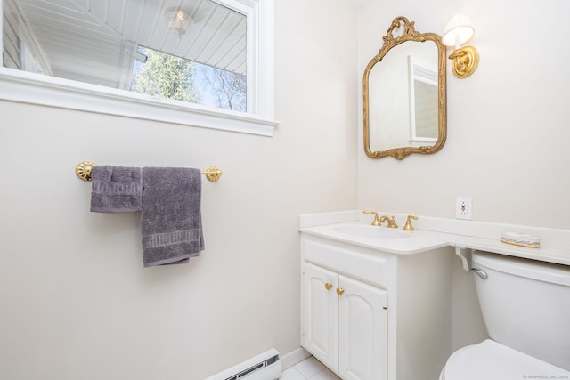 bathroom featuring toilet and vanity