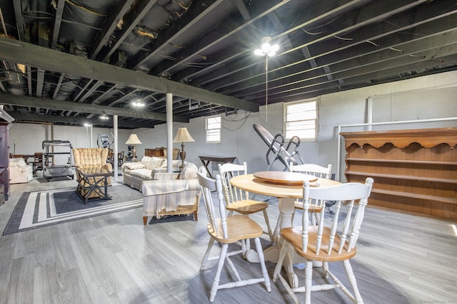 dining space featuring wood finished floors