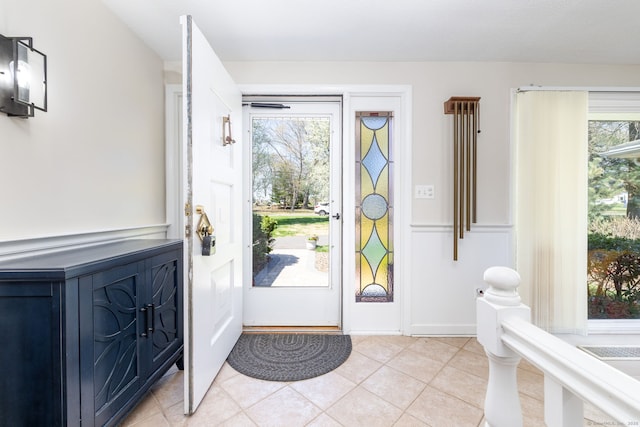 entryway featuring light tile patterned floors
