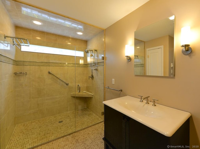 bathroom with tile patterned floors, vanity, recessed lighting, and a shower stall