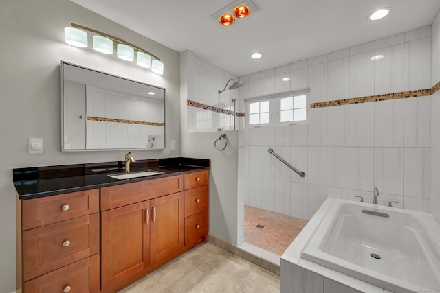 full bath featuring a walk in shower, recessed lighting, a bath, and vanity