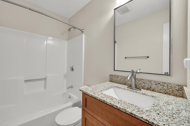 bathroom featuring vanity, bathtub / shower combination, visible vents, and toilet