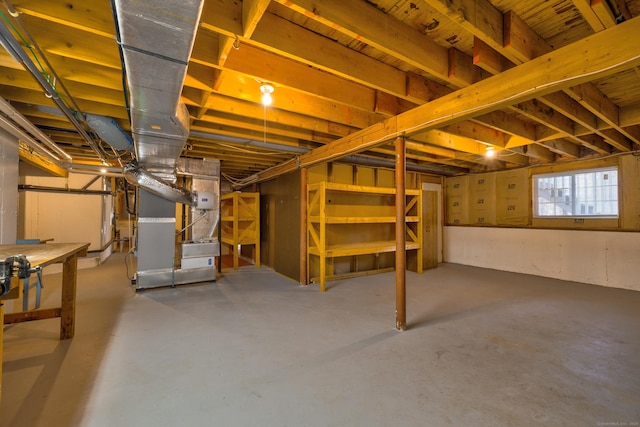 basement featuring heating unit