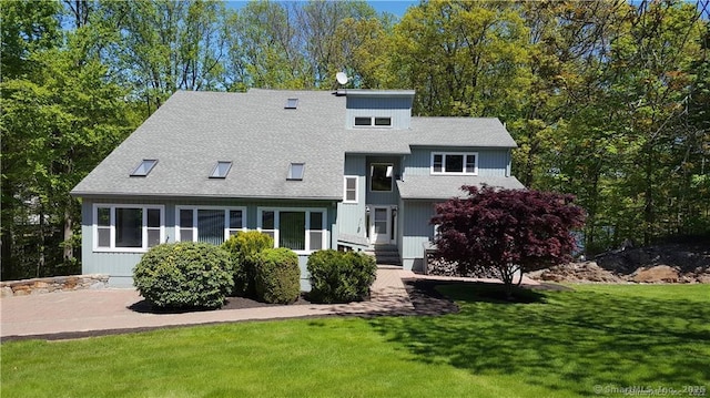210 Founders Way, Stratford, CT 06614 - back of house with a shingled roof and a yard