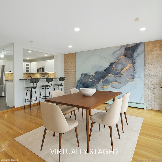 210 Founders Way, Stratford, CT 06614 - dining space featuring a baseboard radiator, light wood-style floors, and recessed lighting