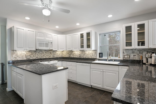 210 Founders Way, Stratford, CT 06614 - kitchen with a sink, backsplash, white cabinetry, glass insert cabinets, and white appliances