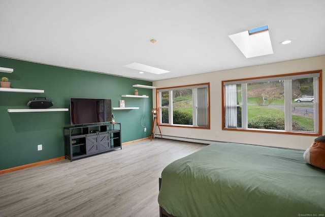 210 Founders Way, Stratford, CT 06614 - bedroom with recessed lighting, wood finished floors, a skylight, and baseboards