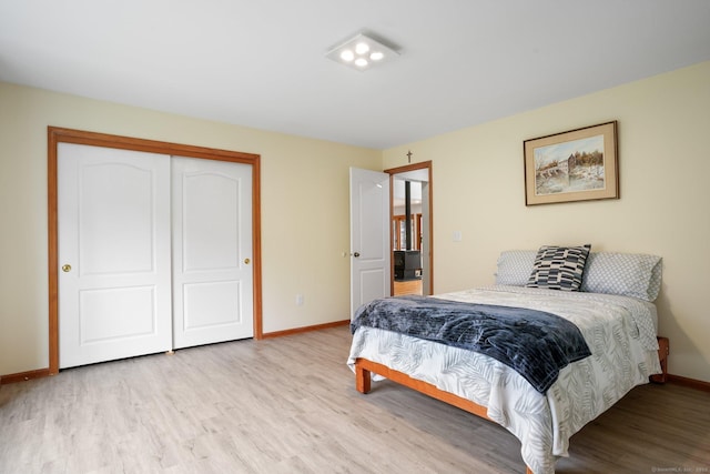 210 Founders Way, Stratford, CT 06614 - bedroom featuring wood finished floors, baseboards, and a closet