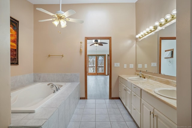 210 Founders Way, Stratford, CT 06614 - bathroom with double vanity, a garden tub, a ceiling fan, and a sink