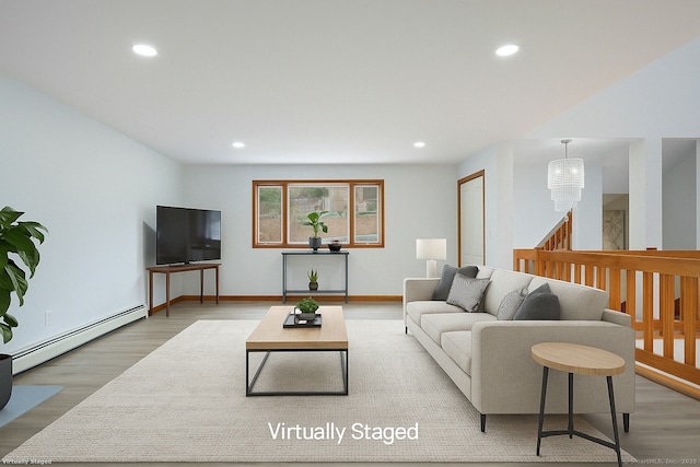 210 Founders Way, Stratford, CT 06614 - living room featuring a baseboard heating unit, wood finished floors, and recessed lighting