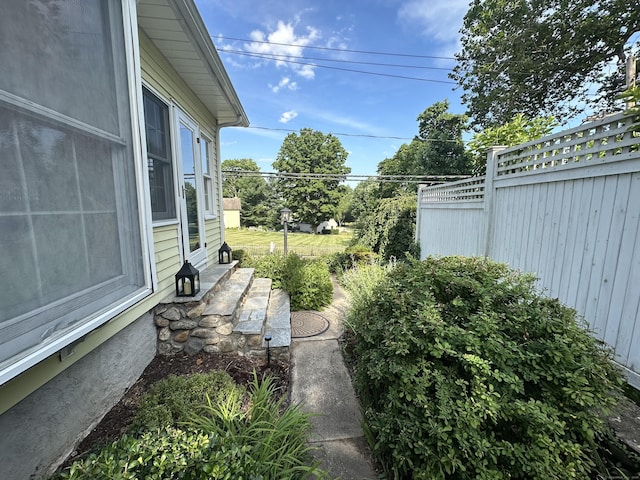 view of yard featuring fence
