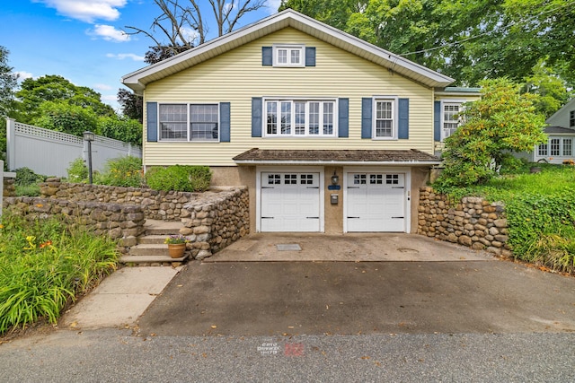 16 N Main St, Essex, CT 06426 - traditional-style home with an attached garage and asphalt driveway