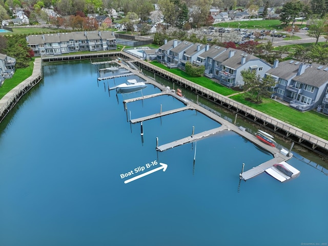 exterior space featuring a water view and a residential view