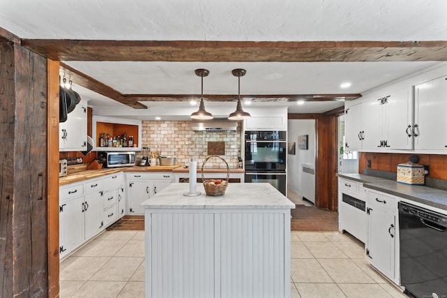 kitchen featuring beam ceiling, white cabinetry, black appliances, a kitchen island, and light tile patterned floors