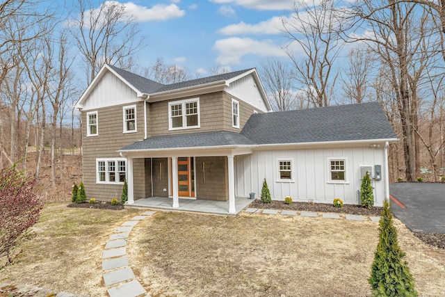8 Fox Run, Monroe, CT 06468 - view of front of property with roof with shingles, covered porch, and board and batten siding