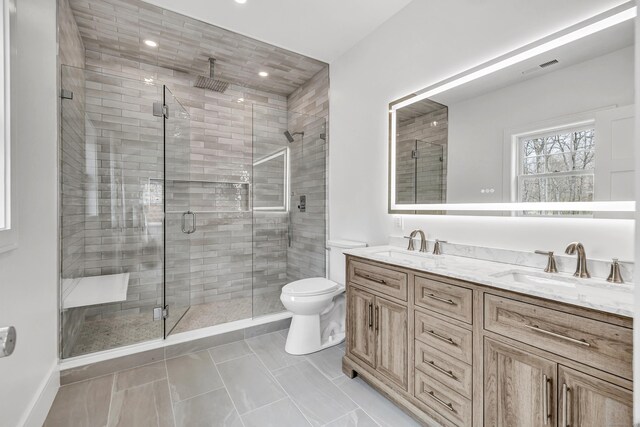 8 Fox Run, Monroe, CT 06468 - bathroom featuring a shower stall, double vanity, toilet, and recessed lighting