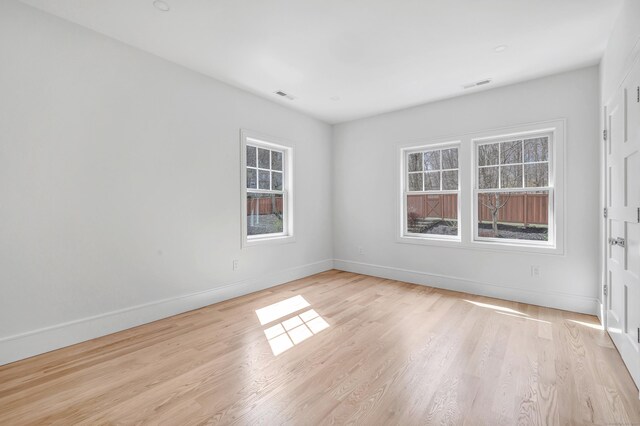 8 Fox Run, Monroe, CT 06468 - empty room with baseboards and light wood finished floors