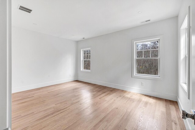 8 Fox Run, Monroe, CT 06468 - spare room featuring healthy amount of natural light, light wood-style floors, and baseboards