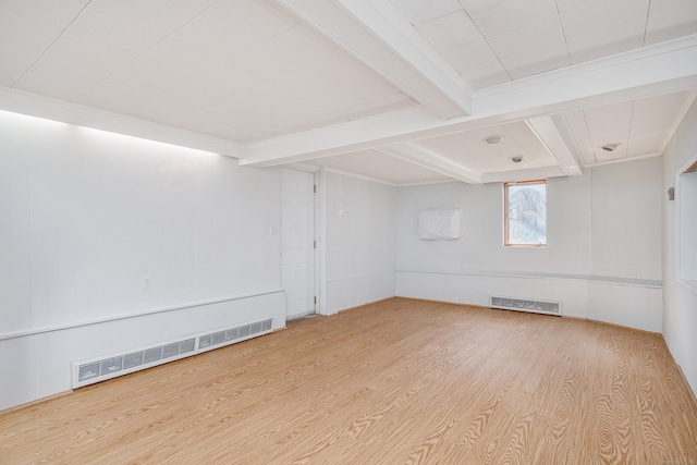 below grade area with wood finished floors and visible vents