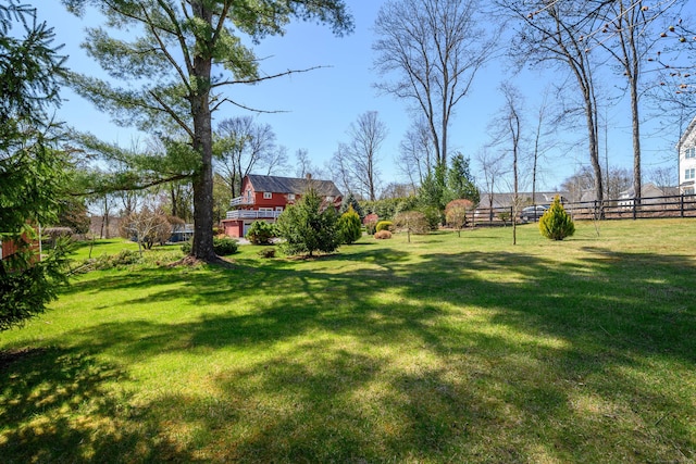 view of yard with fence
