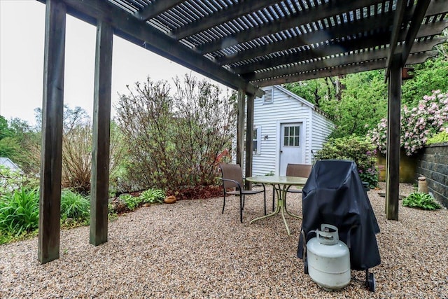 view of patio / terrace with a pergola, grilling area, and outdoor dining area