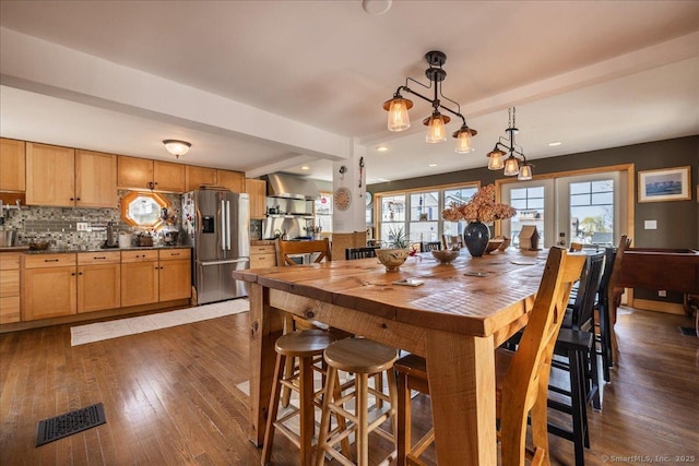 dining area featuring recessed lighting, visible vents, beam ceiling, and dark wood finished floors