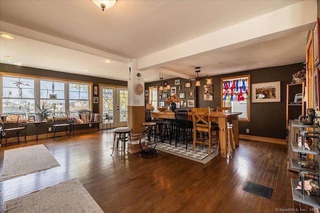 dining area with beamed ceiling, recessed lighting, visible vents, baseboards, and wood finished floors