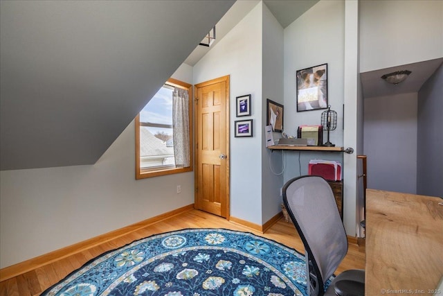 38 Elaine Rd, Milford, CT 06460 - home office featuring light wood-type flooring and lofted ceiling