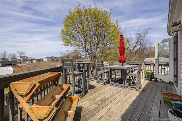 deck featuring outdoor dining space