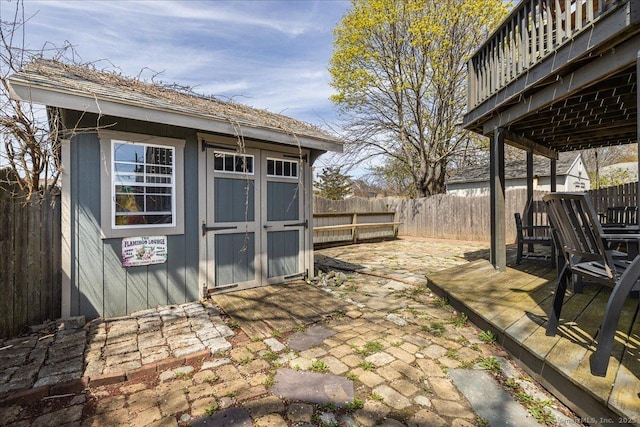view of shed featuring a fenced backyard