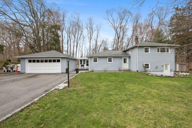 42 Stonecrop Rd, Norwalk, CT 06851 - exterior space featuring a shingled roof, a chimney, entry steps, and a front yard