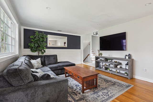 42 Stonecrop Rd, Norwalk, CT 06851 - living area with wood finished floors, stairs, a wainscoted wall, visible vents, and recessed lighting