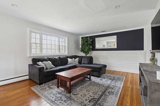 42 Stonecrop Rd, Norwalk, CT 06851 - living room with a baseboard heating unit, wainscoting, visible vents, recessed lighting, and wood finished floors