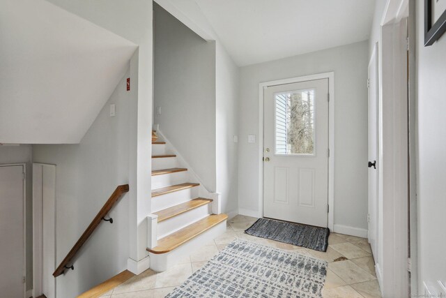 42 Stonecrop Rd, Norwalk, CT 06851 - foyer with stairway, baseboards, and light tile patterned floors