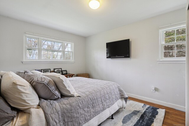 42 Stonecrop Rd, Norwalk, CT 06851 - bedroom featuring baseboards and wood finished floors