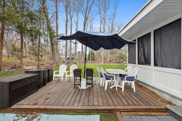 42 Stonecrop Rd, Norwalk, CT 06851 - wooden terrace with a lawn and outdoor dining space