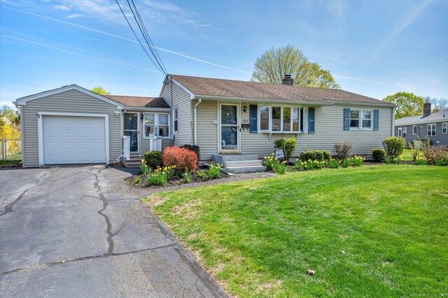 117 E E Side Dr, Wallingford, CT 06492 - single story home with a chimney, aphalt driveway, a shingled roof, a front lawn, and an attached garage
