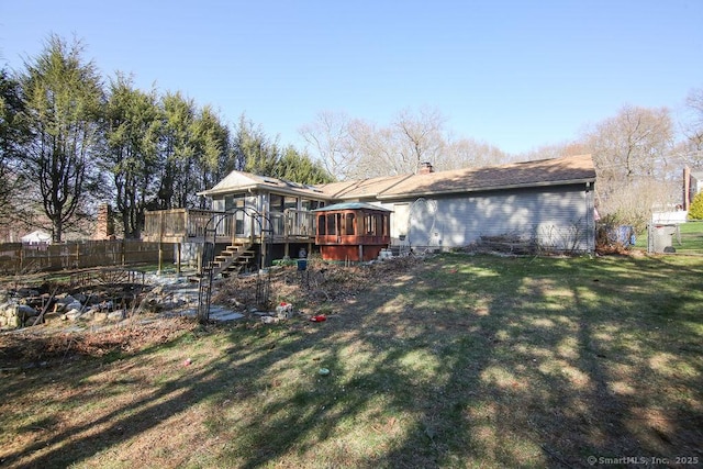 20 Sims Rd, Bristol, CT 06010 - view of yard with fence, a wooden deck, a sunroom, and stairway