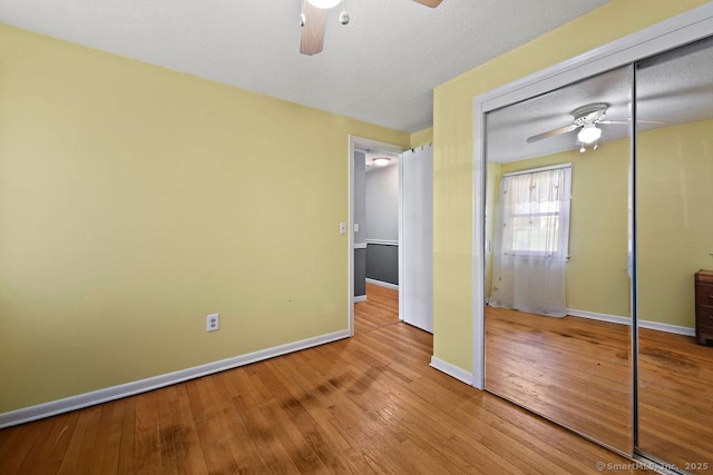 20 Sims Rd, Bristol, CT 06010 - unfurnished bedroom with baseboards, a ceiling fan, wood finished floors, and a closet