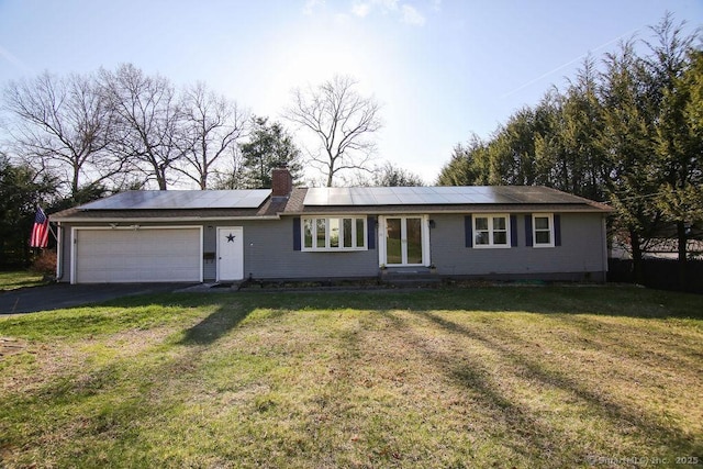 20 Sims Rd, Bristol, CT 06010 - ranch-style house with a chimney, aphalt driveway, an attached garage, roof mounted solar panels, and entry steps