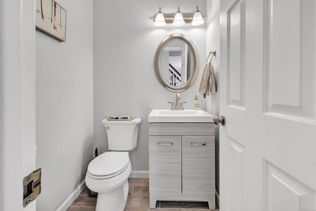 190 Thoreau Dr, Shelton, CT 06484 - bathroom featuring toilet, vanity, and baseboards