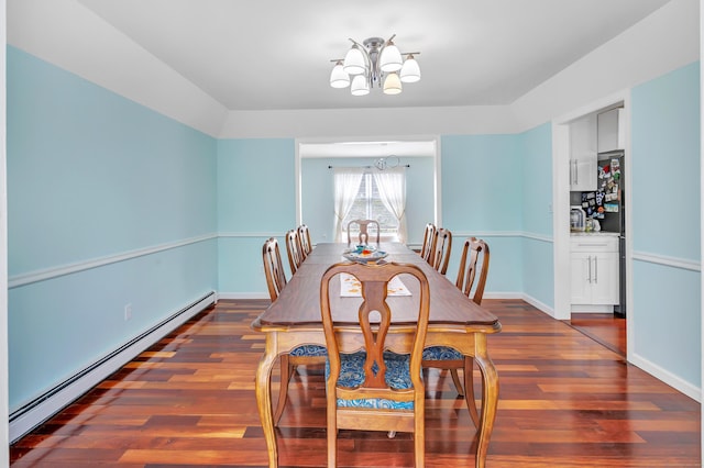 190 Thoreau Dr, Shelton, CT 06484 - dining room with a baseboard radiator, dark wood-type flooring, and an inviting chandelier