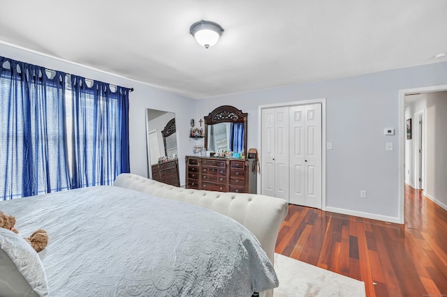 190 Thoreau Dr, Shelton, CT 06484 - bedroom with wood finished floors, a closet, and baseboards