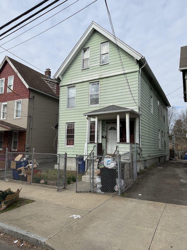 148 Plymouth St, New Haven, CT 06519 - traditional-style house with a gate and a fenced front yard