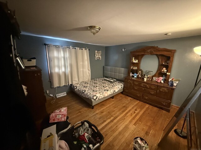 148 Plymouth St, New Haven, CT 06519 - bedroom featuring wood finished floors and visible vents