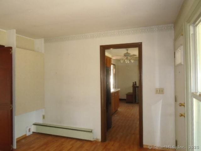 35 Greenhouse Blvd, West Hartford, CT 06110 - spare room featuring wood finished floors, a ceiling fan, and baseboard heating
